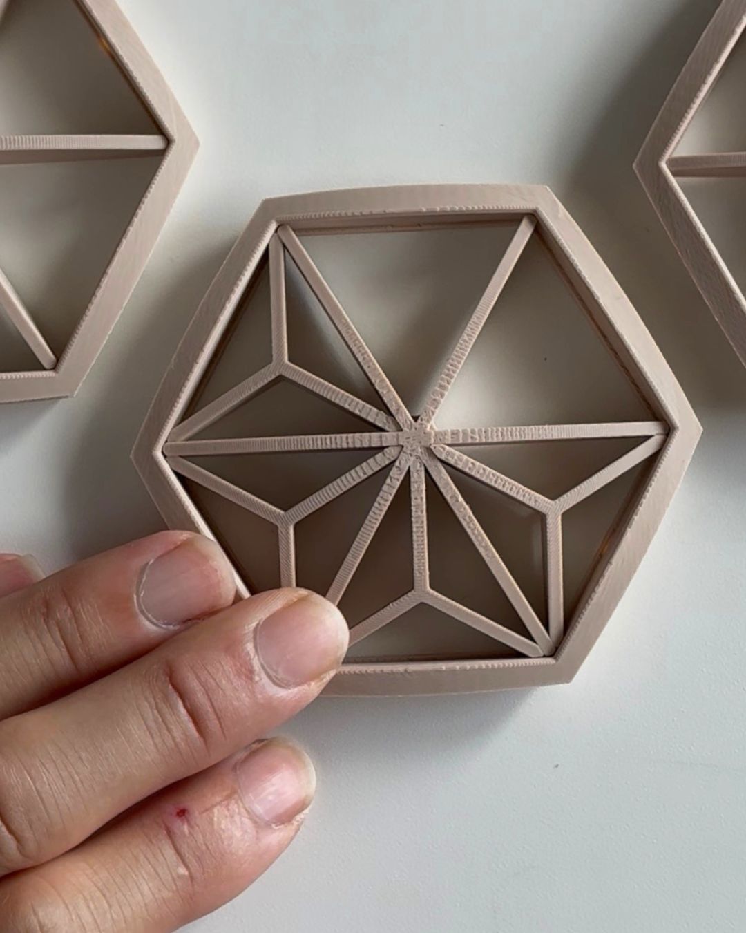 Small kumiko insert fitted into a hexagon frame